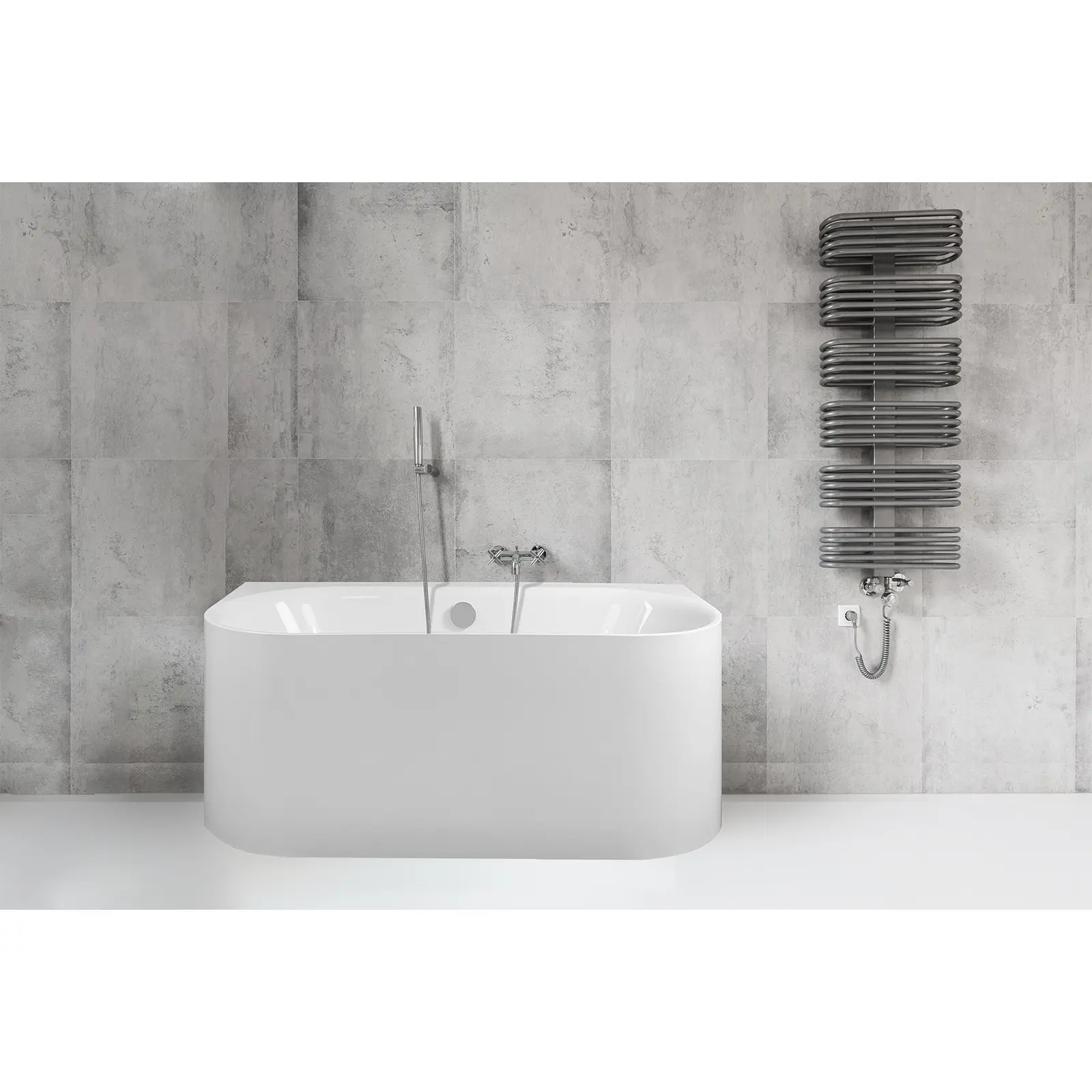 Eine ovale, weiße Badewanne mit glatten Oberflächen steht vor einer grauen, gefliesten Wand. Rechts ist ein schlanker Heizkörper in geschwungener Form montiert.